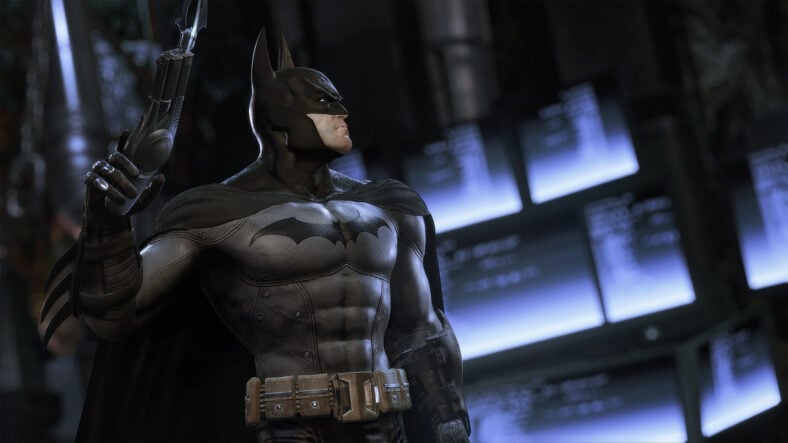 Batman (Kevin Conroy) stands ready in the Batcave in Batman: Arkham Asylum (2009), Warner Bros. Interactive Entertainment