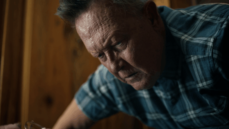 The Auggie of Earth-X (Robert Patrick) learns the truth about his son's identity in Peacemaker Season 2 Episode 6 "Ignorance is Chris" (2025), DC Studios