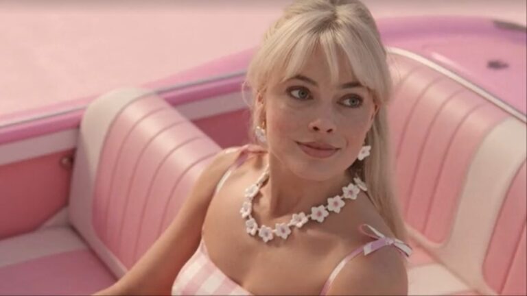 Barbie (Margot Robbie) as Barbie in her convertible in Barbie 2024, by Warner Bros