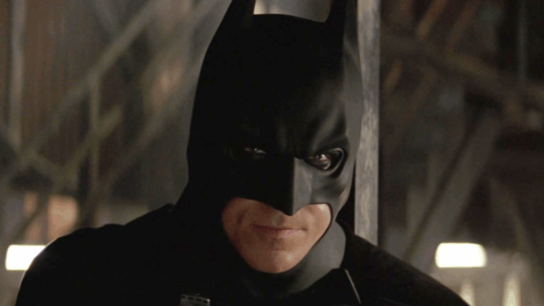 The Dark Knight (Christian Bale) asks Rachel (Katie Holmes) for help investigating Dr. Crane (Cillian Murphy) in Batman Begins (2005), Warner Bros. Pictures