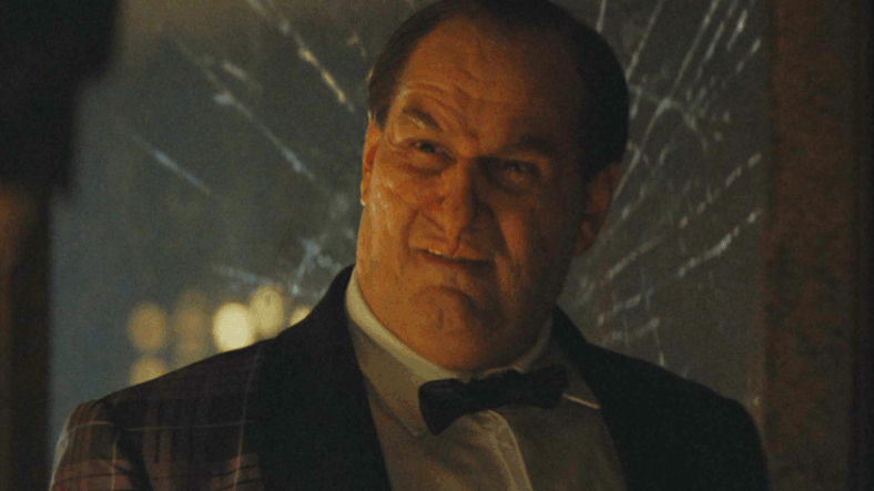 The Penguin (Colin Farrell) taunts a frustrated Batman (Robert Pattinson) in The Batman (2022), Warner Bros. Pictures