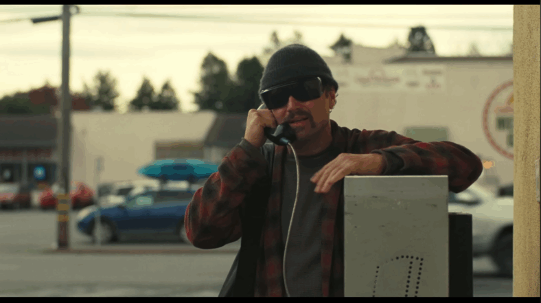 Leo DiCaprio calls collect in One Battle After Another (2025), Warner Bros. Pictures