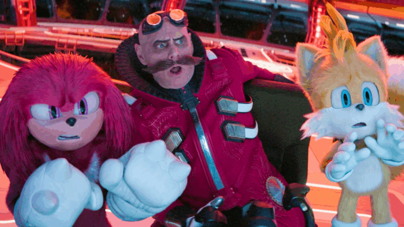 Knuckles (Idris Elba), Dr. Robotnik (Jim Carrey), and Tails (Colleen O'Shaughnessey) are caught off-guard by their accidental cutting of the Moon in Sonic the Hedgehog 3 (2024), Paramount Pictures