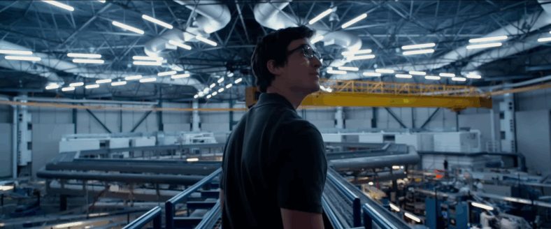 Reed (Miles Teller) likes his new workspace in Fantastic Four (2015), 20th Century Studios