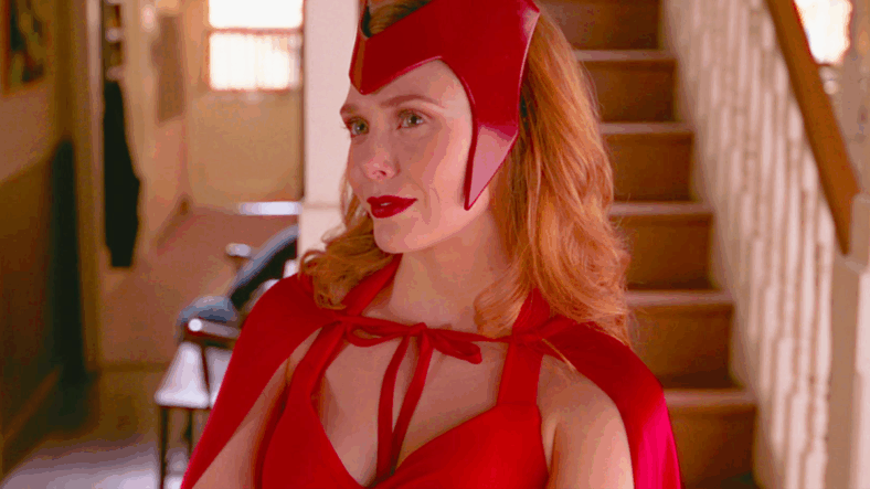 Wanda Maximoff (Elizabeth Olsen) dons her classic comic book costume in WandaVision Season 1 Episode 6 "All-New Halloween Spooktacular!" (2021), Marvel Entertainment