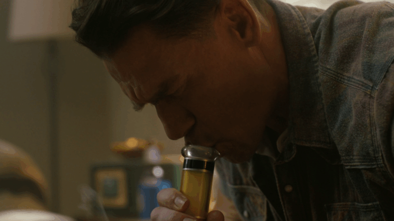 Christopher Smith (John Cena) attempts to numb the pain of rejection in Peacemaker Season 2 Episode 1 "The Ties That Grind" (2025), DC Studios