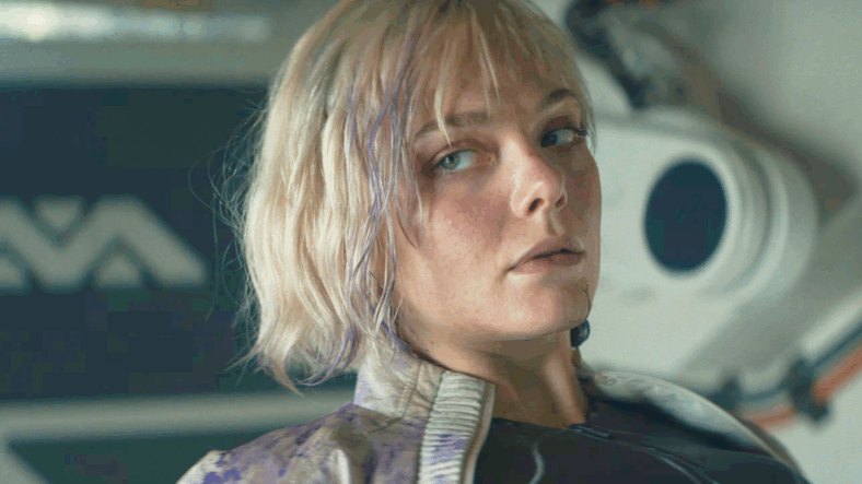 Thia (Elle Fanning) finds herself without a leg to stand on in Predator: Badlands (2025), 20th Century Studios