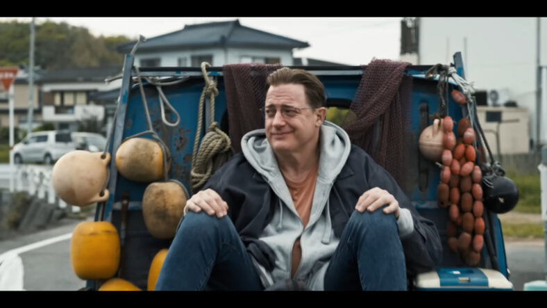 Phillip Vandarploeug (Brendan Fraser) hitches a ride in Rental Family (2025), Searchlight Pictures