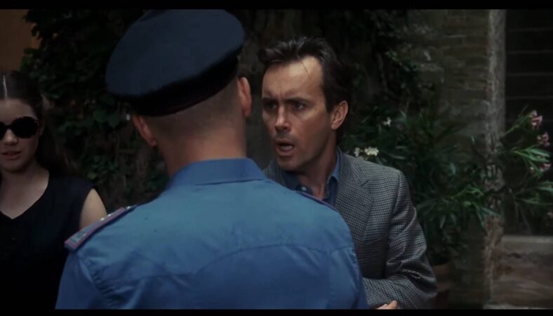 Jeffery Combs tells the skeptical authorities that there's someone in the dungeons in Castle Freak (1995) Full Moon Entertainment