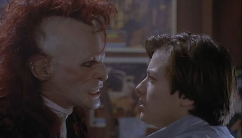 Trickster (T. Ryder Smith) gives Michael a pep talk in Brainscan (1994) Triumph Films