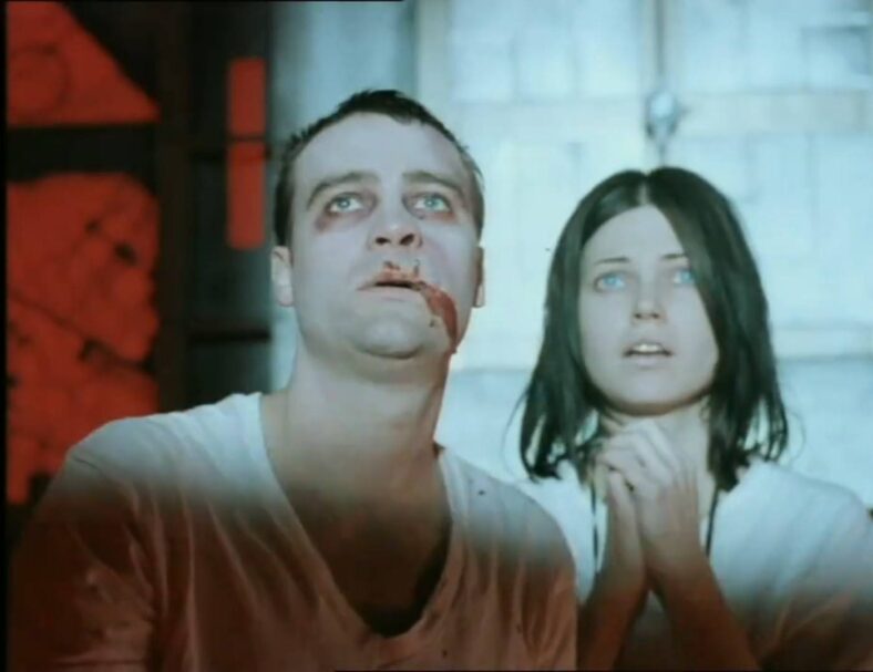 David Hewlett and Nicole de Boer are dreading what's coming next in Cube (1997), Trimark Pictures