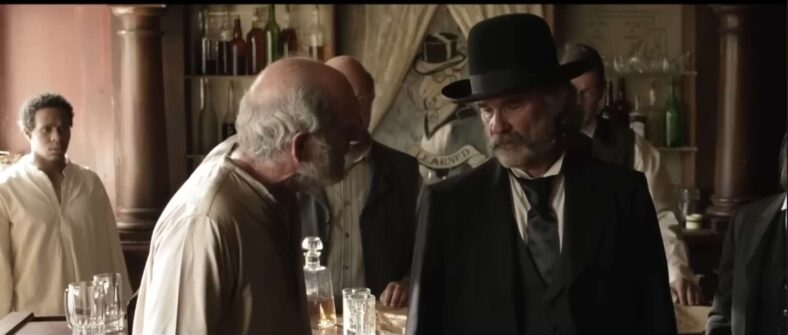 Kurt Russell tries to explain to his Deputy that he's too old to regulate in Bone Tomahawk (2015), RLJ Entertainment