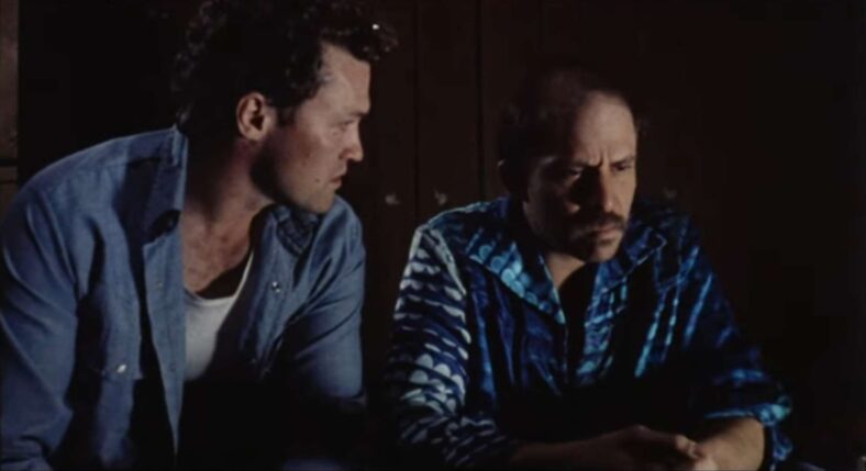 Otis (Tom Towles) considers following joining Henry's (Michael Rooker) murder crusade in Henry: Portrait of a Serial Killer (1986), Greycat Films   