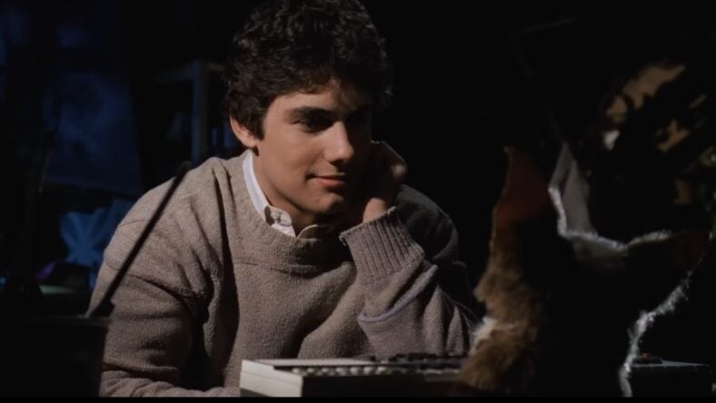 Gizmo shows Zach Galligan why he should play with greats like Giorgio Moroder and Ray Manzarek in Gremlins (1984), Warner Bros. Pictures