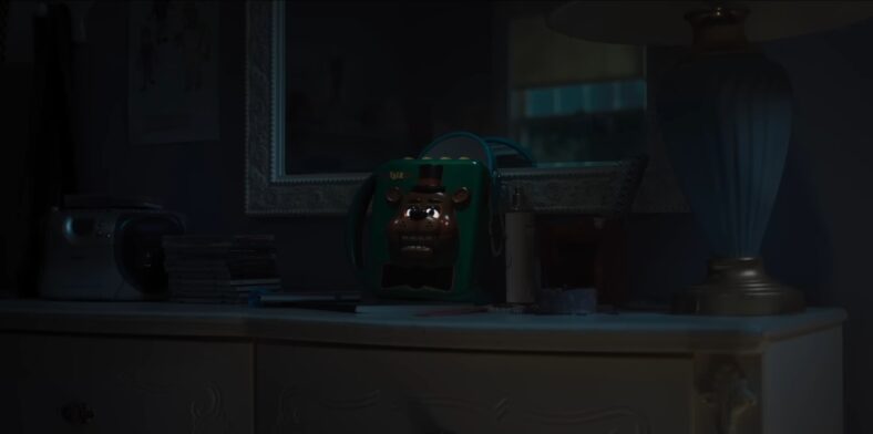 The evil speaks through static and brokenness, but batteries aren't included, in Five Nights At Freddy's 2 (2025), Universal Pictures