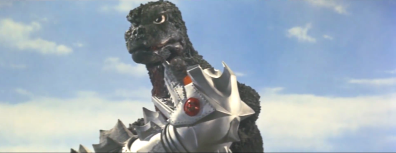 Godzilla figures out Mechagodzilla's head is a twist-off in Terror of Mechagodzilla (1975), Toho Co. Ltd.