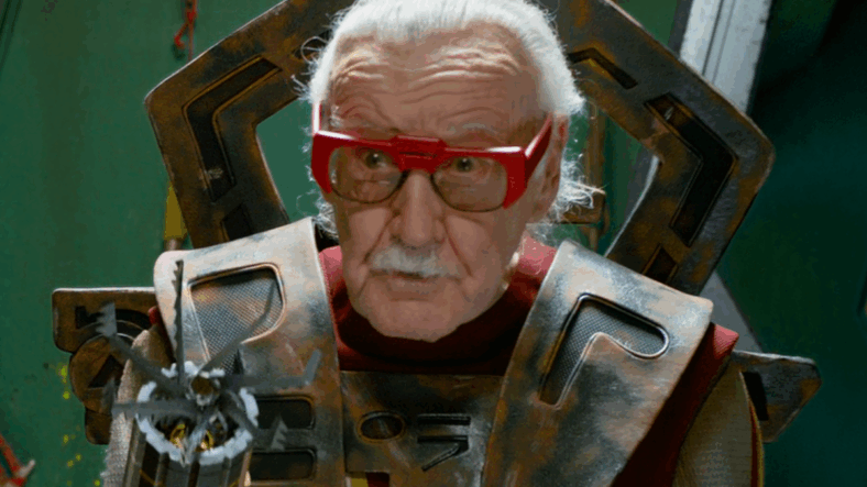 A Watcher (Stan Lee) readies Thor (Chris Hemsworth) for a haircut in Thor: Ragnarok (2017), Marvel Entertainment
