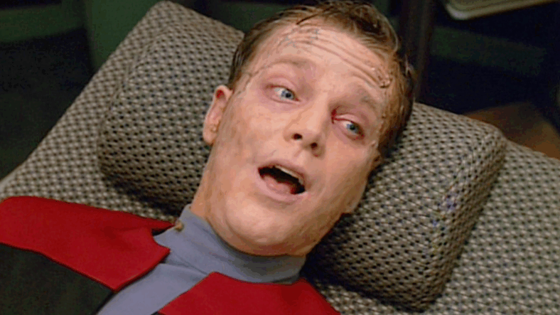 Lieutenant Paris (Robert Duncan McNeil) begins to feel the effects of accelerated evolution in Star Trek: Voyager Season 2 Episode 15 "Threshold" (1996), Paramount