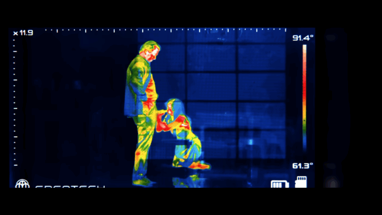 Frank Drebin Jr. (Liam Neeson) and Beth Davenport (Pamela Anderson) spend time together in The Naked Gun (2025),