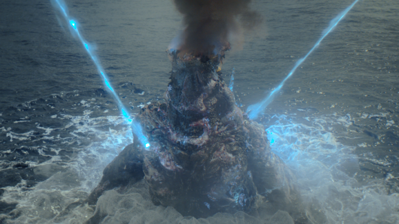 The headless corpse of Godzilla disintegrates into atomic nothingness in Godzilla Minus one (2023), Toho Co. Ltd.