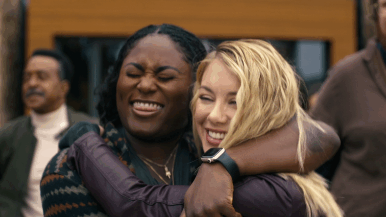 Adebayo (Danielle Brooks) and Harcourt (Jennifer Holland) celebrate the opening of Checkmate in Peacemaker Season 2 Episode 8 "Full Nelson" (2025), DC Studios
