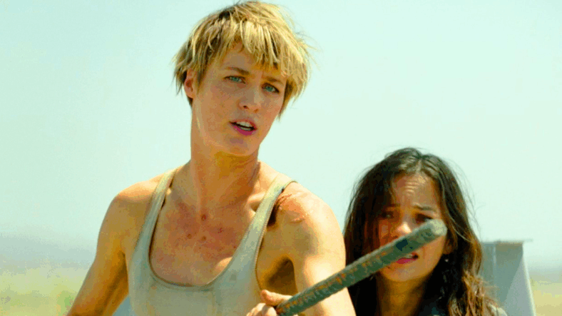 Grace (Mackenzie Davis) stands in defense of Dani (Natalia Reyes) in Terminator: Dark Fate (2019), Paramount Pictures