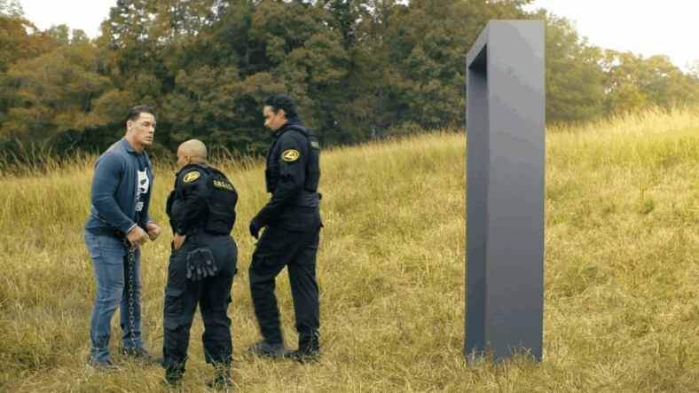 Christopher Smith (John Cena) has no idea why Agent Vega (Reinaldo Faberlle) and Agent Angler (Anissa Matlock) have taken him to Sanctuary in Peacemaker Season 2 Episode 8 "Full Nelson" (2025), DC Studios