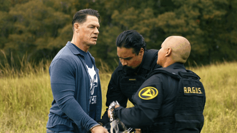 Christopher Smith (John Cena) has no idea why Agent Vega (Reinaldo Faberlle) and Agent Angler (Anissa Matlock) have taken him to Sanctuary in Peacemaker Season 2 Episode 8 "Full Nelson" (2025), DC Studios
