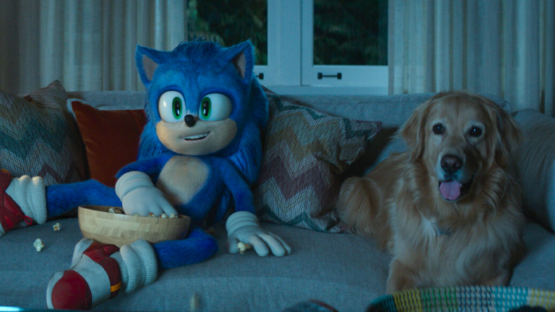 Sonic (Ben Schwartz) and Ozzie watch TV together in Sonic the Hedgehog 2 (2022), Paramount Pictures