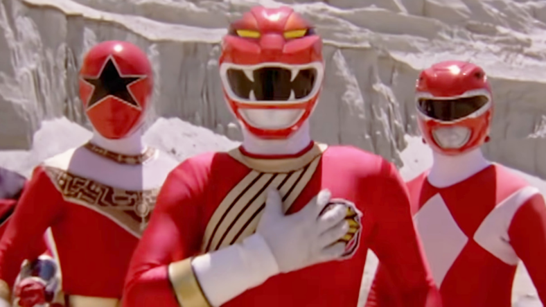 The Red Lion Wild Force (Ricardo Medina Jr.) stands with his fellow Reds in Power Rangers Wild Force Episode 34 "Forever Red" (2002), Hasbro (Footage originally from Gaoranger vs. Super Sentai, Forever Red (2001), Toei Co. Ltd.)