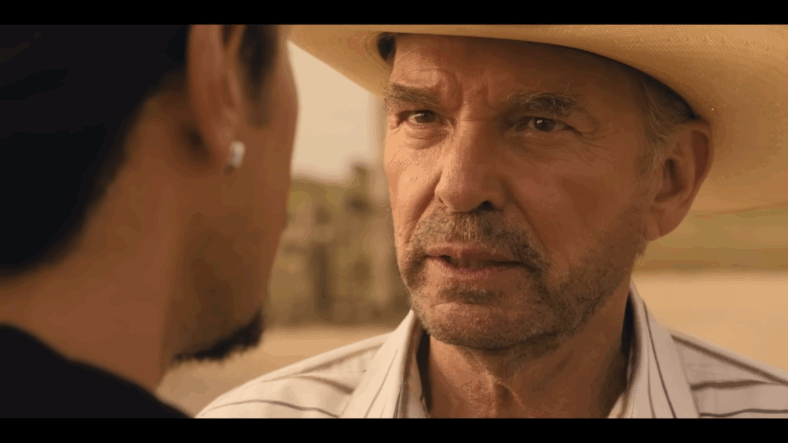 Tommy Norris (Billy Bob Thornton) has a friendly word of advice for Jimenez (Alex Meraz) in Landman Season 1 Episode 5 "Where Is Home" (2024), Paramount Network